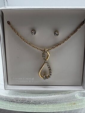 Infinity Crystal Pendant Necklace gold tone with Clear Crystal Stud earrings NIB